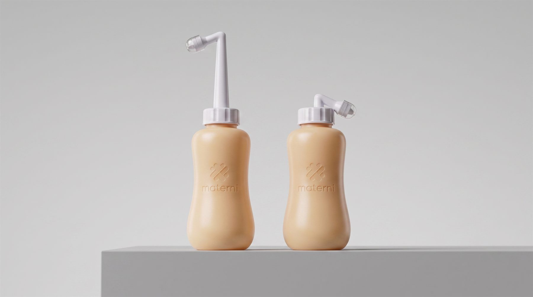 Materni peri bottle nozzle, extended and retracted